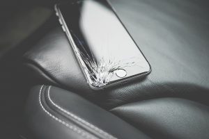 mobile phone with broken screen - 7 Reasons to hire a moving company - JR cleaning and removals - Sheffield, Rotherham and rest of South Yorkshire